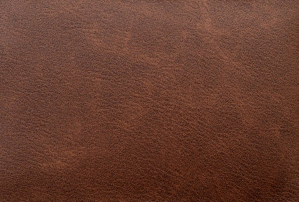 istock Natural brown leather texture or background, top view, space for text 1455409054