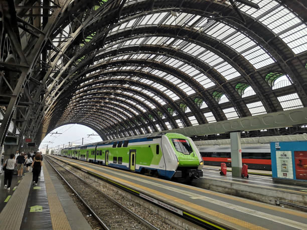 Jakarta, Indonesia - 2 August 2025: High angle view of commuter trains at a railway depot in Jakarta, Indonesia. Multiple parallel tracks represent the urban mass transit system and transportation infrastructure.