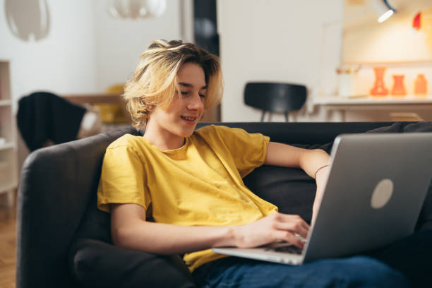 istock Teenager boy at home 1455411962