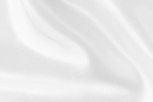 istock White fabric texture for background and design, beautiful pattern of silk or linen. 1455414863