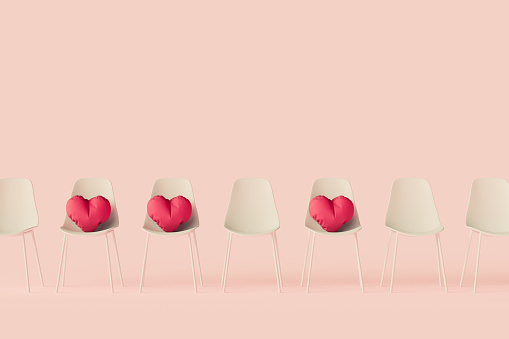 Hearts on modern chairs waiting for the right moment
