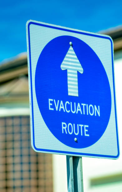 istock Evacuation route signal, blue on white 1455429655