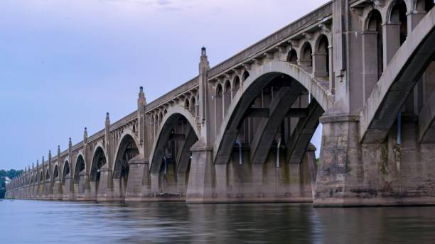 istock Old bridge with blue sky over the sea 1455429853