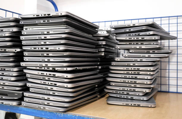 istock Big stacks of discarded laptops 1455430395