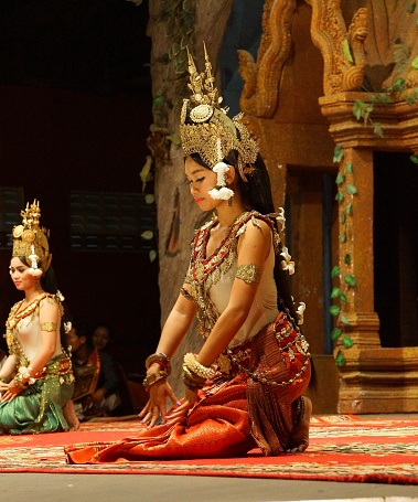 siem rep, Cambodia – December 02, 2015: A vertical shot of an Apsara dancer performing at an evening recital in Krong Siem Reap, Cambodia