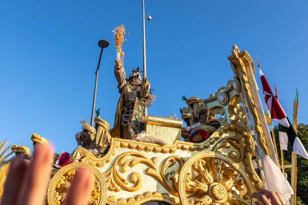 Seville, Spain 01-05-2023 big crowds at Los Reyes Magos (Three wise men) parade in Sevilla. The parade is a start to the magical night for kids, when the kings come to their houses to bring presents.