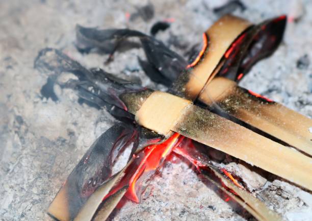 istock Palm Sunday crosses being burned to make ashes for Ash Wednesday 1455434246
