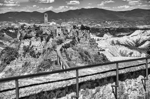 A grayscale shot of elevation of Civitella D'agliano with mountain background in Italy