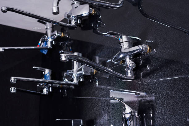 istock Set of modern faucets in a store 1455436616