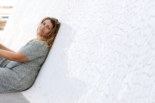 istock Spanish female posing in front of a sloping wall 1455436806