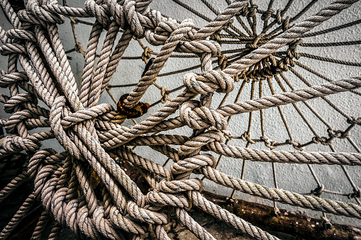 A close-up shot of several ropes tied together looking like a spider web in Kuala Lumpur, Malaysia