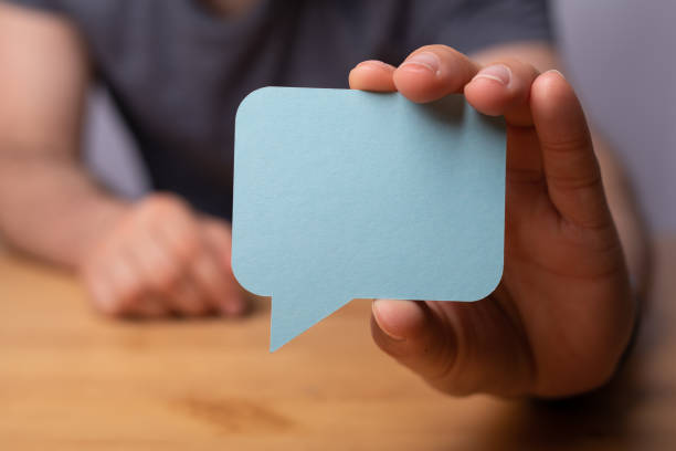 istock Contact support info paper in a person's hand 1455438538