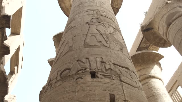 Stock video

Karnak Temple in Luxor, Egypt. The Karnak Temple Complex, commonly known as Karnak, comprises a vast mix of decayed temples, chapels, pylons, and other buildings in Egypt.