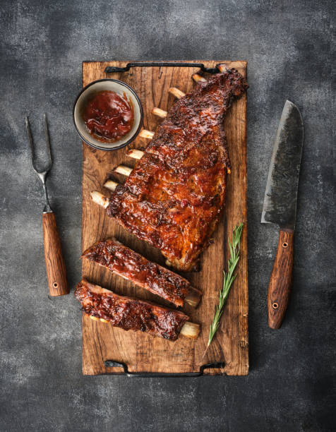 istock Delicious smoked pork ribs glazed in BBQ sauce. 1455441363
