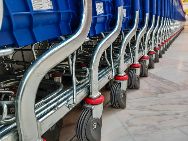 Huge row of parked wheel hypermarket carts