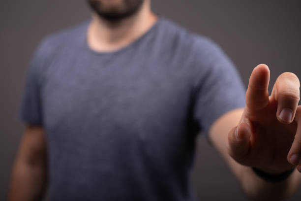 istock 3d rendering of a businessman pointing or touching finger in screen 1455444747