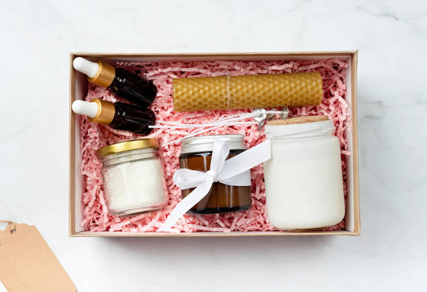 istock Gift box with candle making tools, candle, soy wax, wicks and aroma oil bottles 1455449784