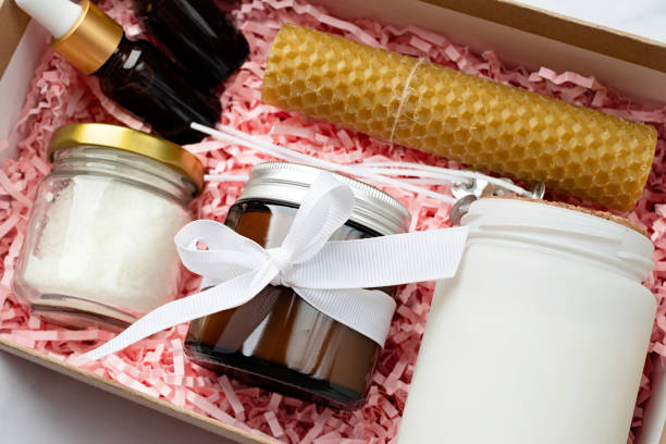 istock Gift box with candle making tools, candle, soy wax, wicks and aroma oil bottles 1455449882