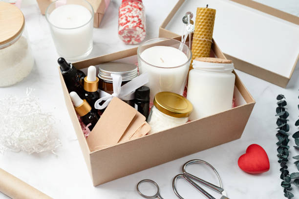 istock Gift box with candle making tools, candle, soy wax, wicks and aroma oil bottles 1455449972