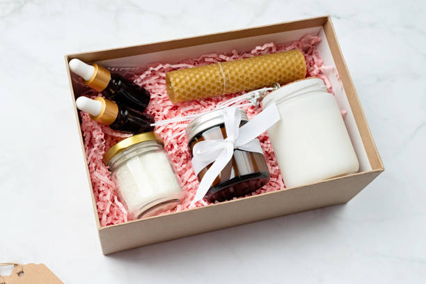 istock Gift box with candle making tools, candle, soy wax, wicks and aroma oil bottles 1455450453