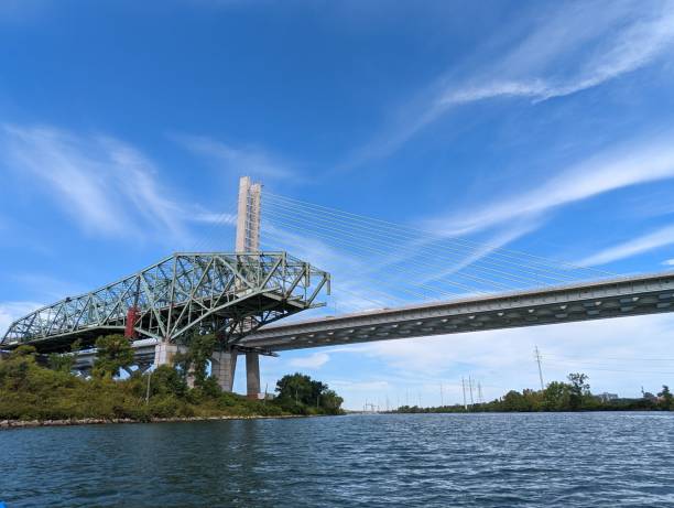 istock Bridge over the lake against the blue sky 1455451593
