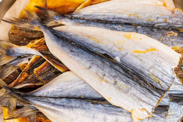 istock Dried fish. Snack for beer. Background with selective focus and copy space 1455454832