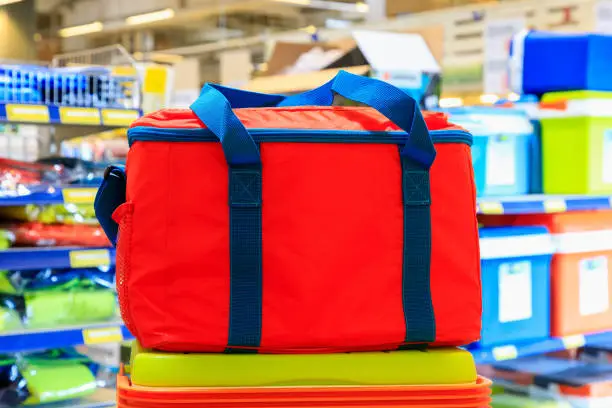 Photo of Cooler bag. Goods in the supermarket. For picnics and rest.