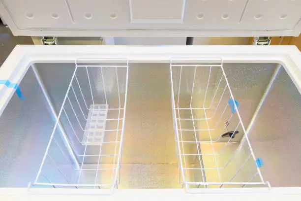 Photo of View inside the freezer. Business equipment. Goods in the supermarket