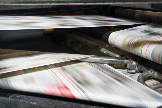 istock Newspaper printing press in a printing plant 1455454938