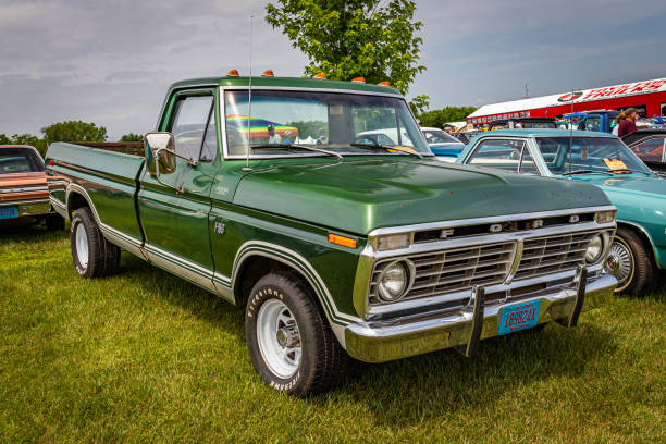 1974 Ford F150 Fleetside Pickup Truck Iola, WI - July 07, 2022: High perspective front corner view of a 1974 Ford F150 Fleetside Pickup Truck at a local car show. 1974 stock pictures, royalty-free photos & images