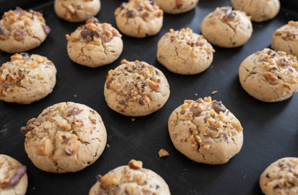 istock Sweet walnut cookies ready to eat on a baking sheet 1455467532