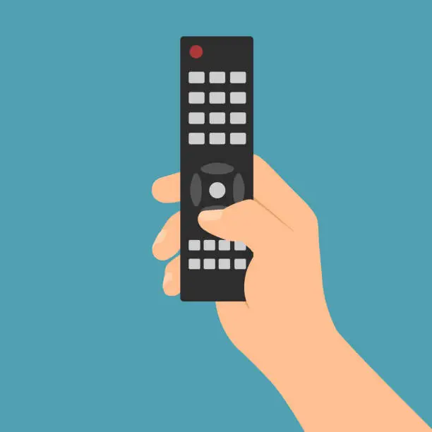 Vector illustration of A male hand holds a remote control for a TV or player and press a button - vector on a green background