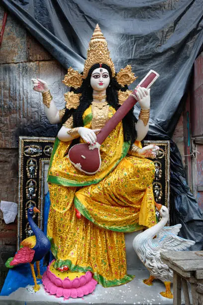 Goddess Saraswati idol is under preparation for upcoming Saraswati Puja festival at a potter's studio. Devi Saraswati is considered as the goddess of knowledge, music, art, wisdom, and learning.