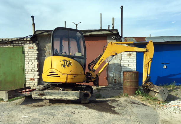 Belarus, Minsk -04.07.2022:JCB Excavator is being repaired on the street.