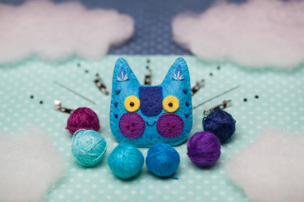 istock close-up brooches animal head, sewn by hand, bright, colored 1455470271