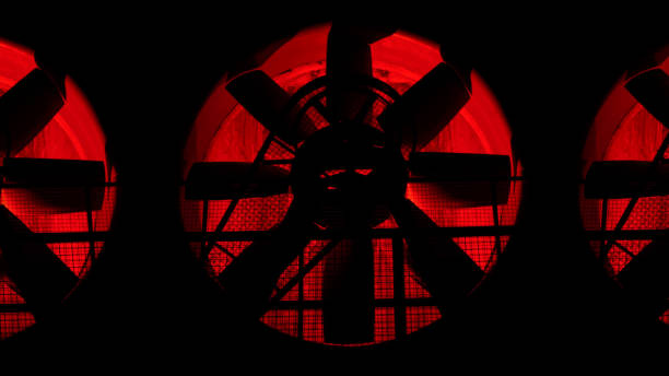 istock Old industrial illuminated ventilators in Germany at night 1455473095