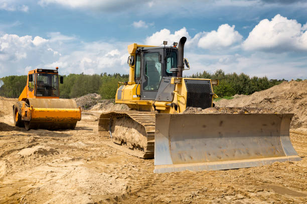 istock Road construction machinery on the construction of  a new  highway 1455479042