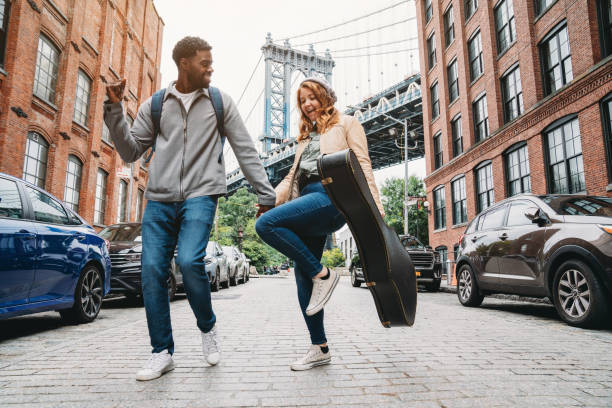 istock A multi-ethnic couple is dancing in Brooklyn with Manhattan Bridge in the background 1455484147