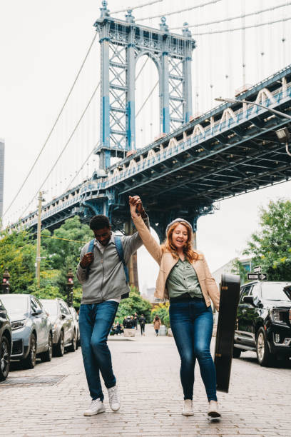 istock A multi-ethnic couple is dancing in Brooklyn with Manhattan Bridge in the background 1455484205