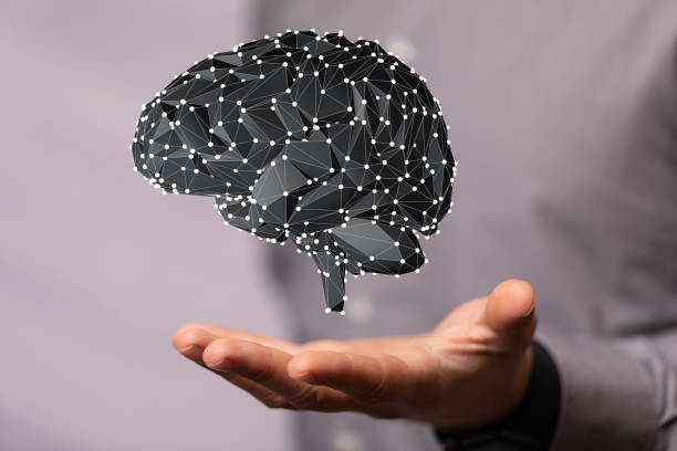 istock Male displaying an idea of artificial intelligence brain 1455489691