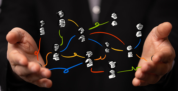 A businessman showing an organization chart - team concept networking