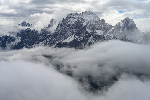 View from northeast direction to the mountains Rotwandspitze (Italian: Croda Rossa; 2,965 m), Elferkofel (Italian: Cima Undici; 3,092 m) and Zwölferkofel (Italian: Cima Dodici; 3,094 m) - from middle to right. It is located in the European Alps, Dolomites, South Tyrol, Italy.