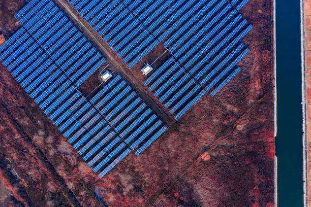 Aerial view solar panels on the tidal flat by the sea