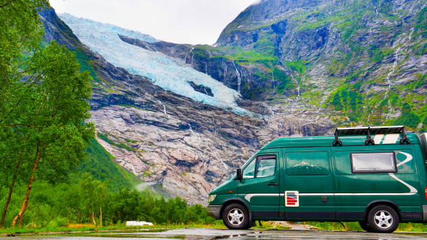 istock Camper van and Boyabreen Glacier in Norway 1455494779