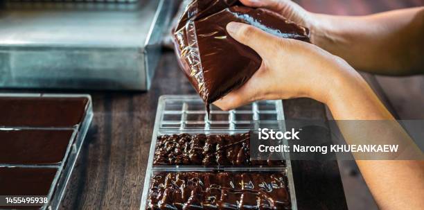 Close Up Of Hand Chef Making Homemade Chocolate Bars Stock Photo - Download Image Now