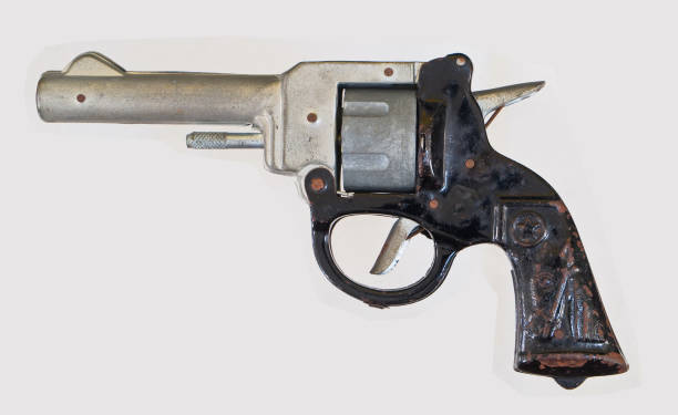 istock vintage tin toy pistol cap gun 1455498132