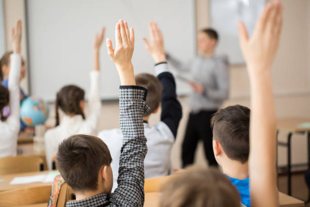 istock School children in classroom at lesson. 1455498586