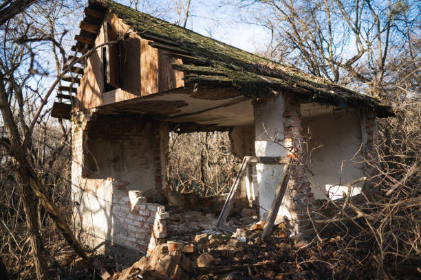 istock old ruined house, not suitable for living, fallen brick wall 1455500454