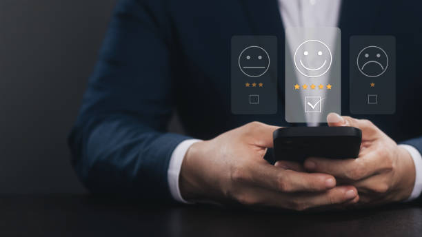 istock User give rating to service experience on online application, Customer review satisfaction feedback survey concept, Customer can evaluate quality of service leading to reputation ranking of business. 1455500455