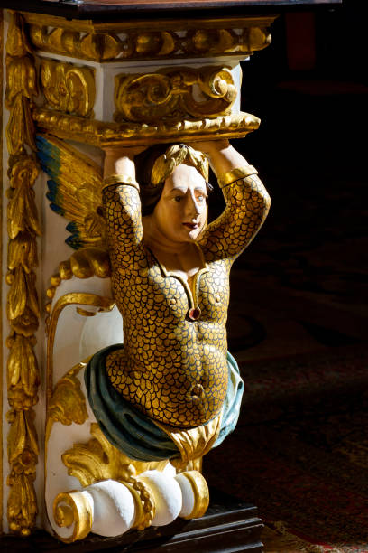 istock Column base with sculpture inside an 18th century baroque church 1455500473